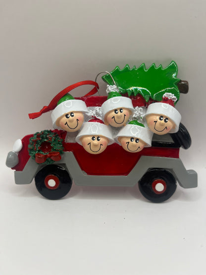 Family of 5 Collecting the Christmas Tree Ornament